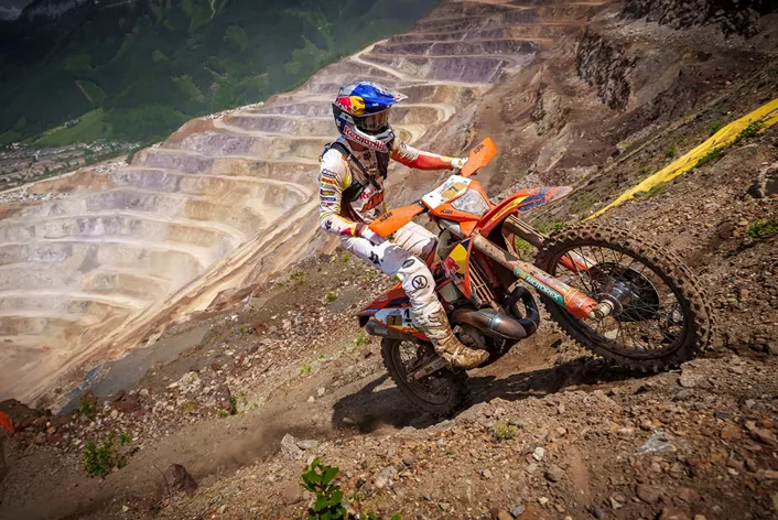 Only 14 out of 500 riders crossed the finish line at the world's toughest Extreme Enduro. Manuel Lettenbichler took control after an early lead change, dominating the Erzberg race to claim victory ahead of Billy Bolt and Teodor Kabakchiev.