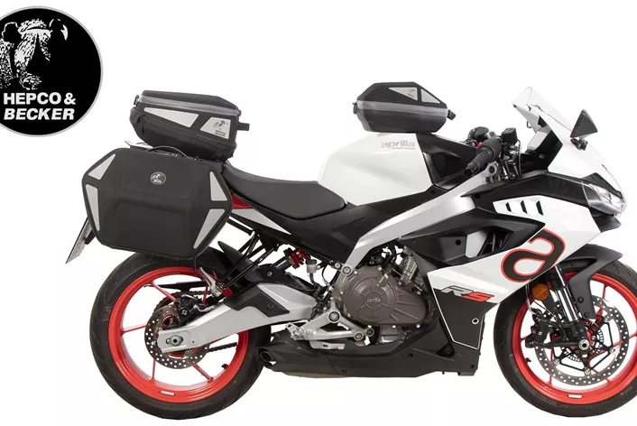 Nová Aprilia RS 457 je športová a ľahká - ale so správnym príslušenstvom od Hepco & Becker sa stáva ideálnou aj na dlhé trasy. Štyri pridané komponenty sľubujú viac komfortu a funkčnosti.