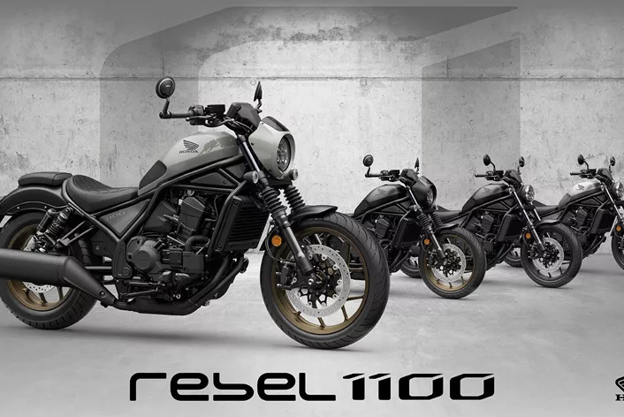 Honda verfrist haar grote cruiserserie. De CMX1100 Rebel, CMX1100 Rebel T en de volledig uitgeruste SE DCT gaan in 2026 van start met nieuwe kleuren - inclusief toercomfort en custom-accessoires af fabriek.
