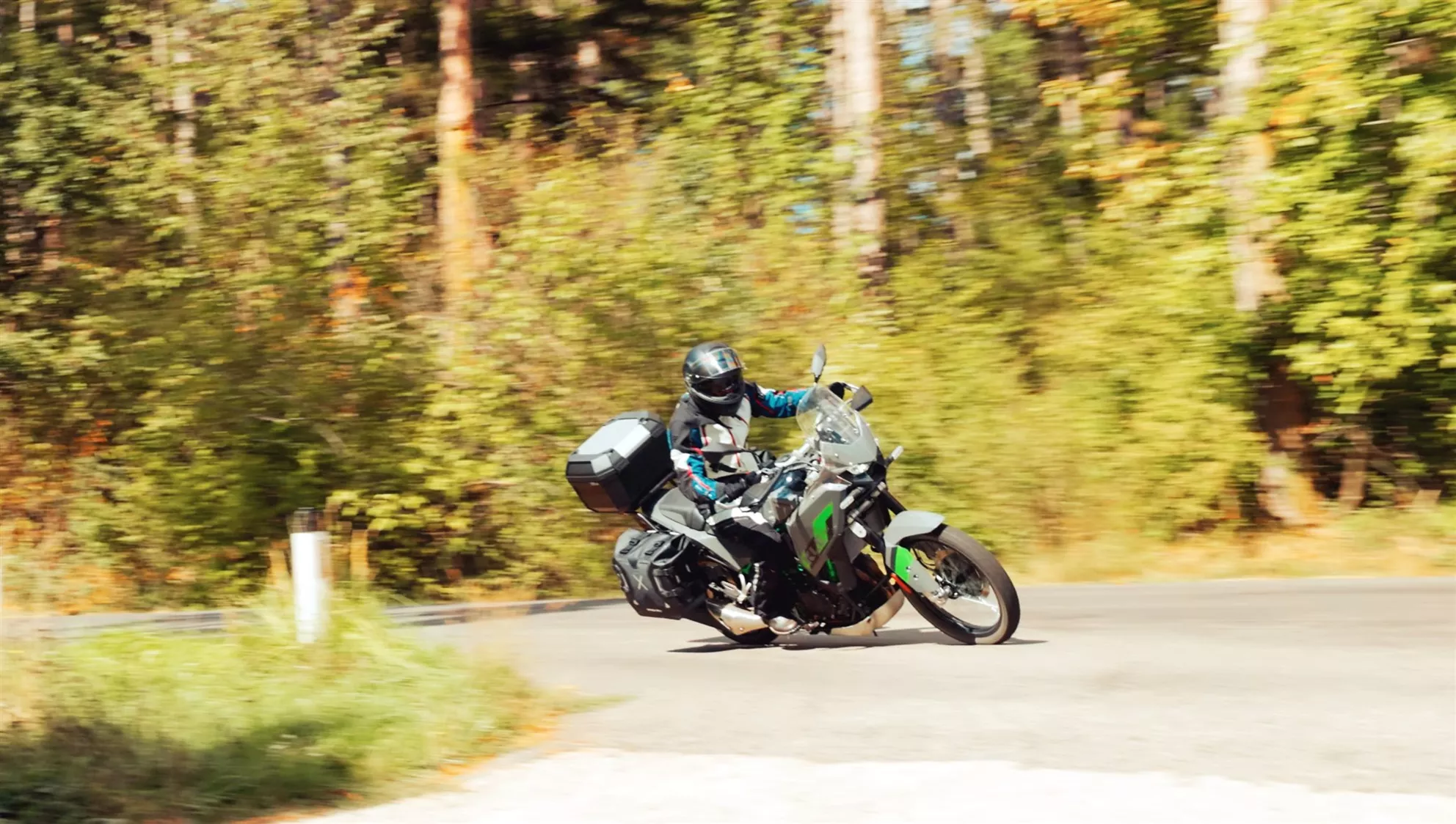 Kawasaki KLE 500 leaned over on a winding country road