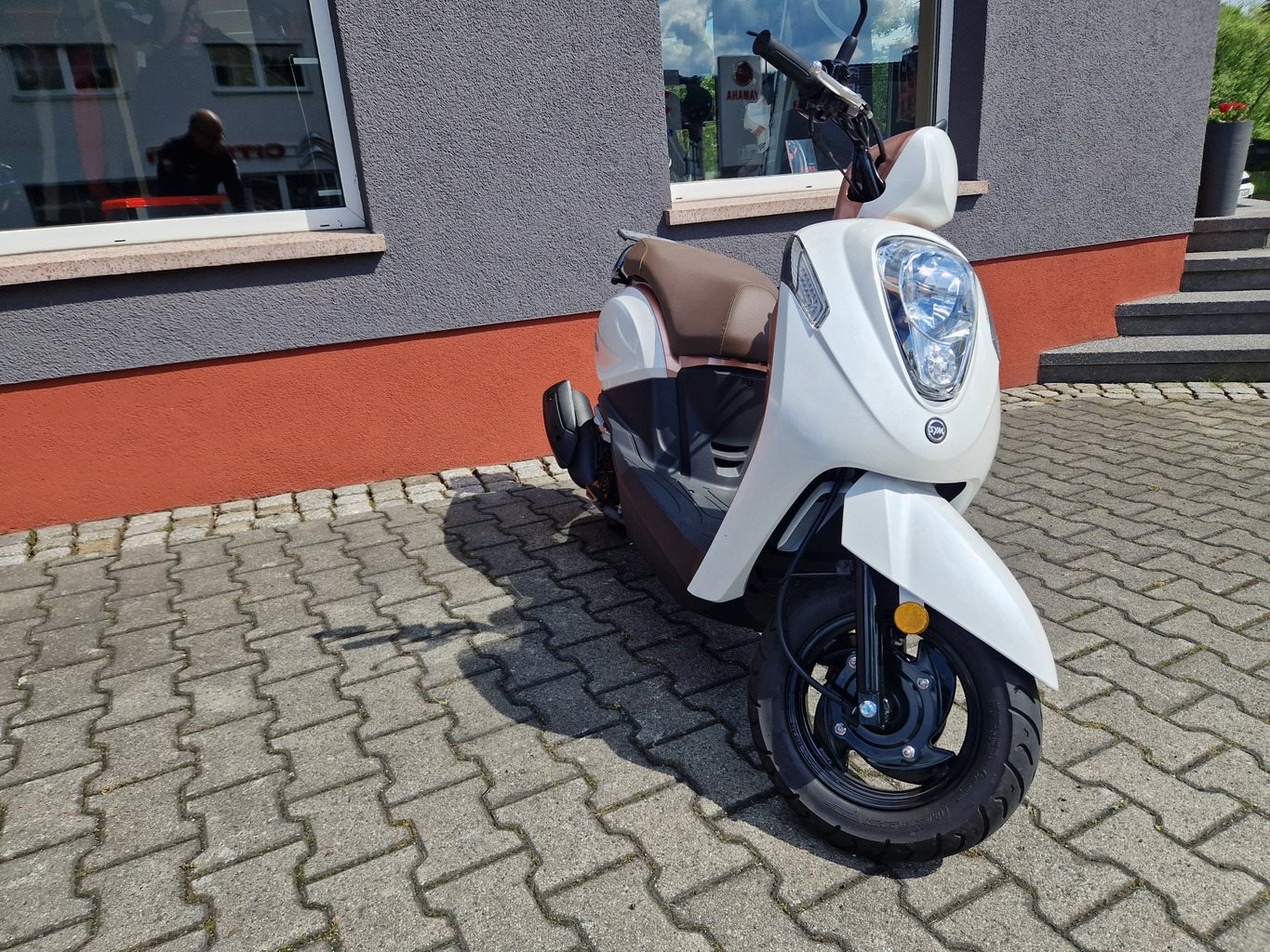 Sym Mio 115