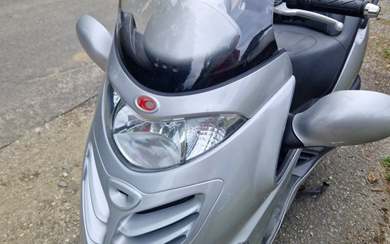 Gebrauchtmotorrad Kymco Grand Dink 125 - Bild 4 Gebrauchtmotorrad Kymco Grand Dink 125 - Bild 4