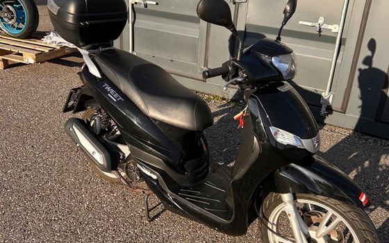 Gebrauchtmotorrad Peugeot Tweet 125 - Bild 8 Gebrauchtmotorrad Peugeot Tweet 125 - Bild 8