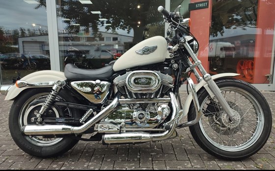 Gebrauchtmotorrad Harley-Davidson Sportster XL 883 Hugger - Bild 1