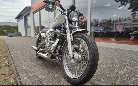 Gebrauchtmotorrad Harley-Davidson Sportster XL 883 Hugger - Bild 2