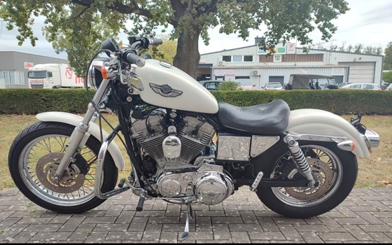 Gebrauchtmotorrad Harley-Davidson Sportster XL 883 Hugger - Bild 5