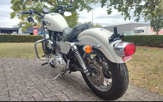 Gebrauchtmotorrad Harley-Davidson Sportster XL 883 Hugger - Bild 6