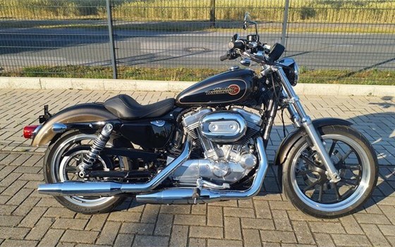 Gebrauchtmotorrad Harley-Davidson Sportster XL 883 L SuperLow - Bild 1