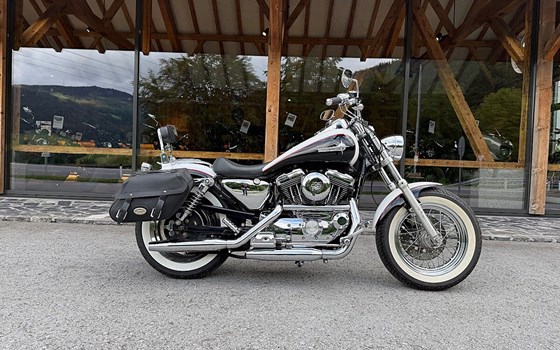 Gebrauchtmotorrad Harley-Davidson Sportster XL 1200C Custom - Bild 1