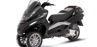 Yamaha Tricity 125 2014 vs Piaggio MP3 125 2009
