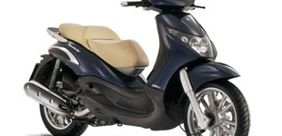 Piaggio Beverly 350ie Sport Touring 2016 vs Piaggio Beverly 400 2011