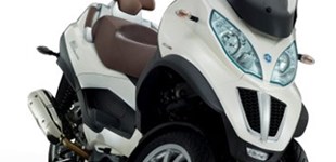 Piaggio MP3 500ie LT Business 2011 vs Yamaha Tricity 125 2022