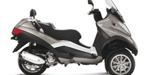 Piaggio MP3 500 Sport Advanced 2021 vs Piaggio MP3 Touring 300 LT 2011