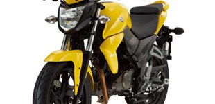 Honda CBR 125 R 2014 vs Sym Wolf SB125Ni 2011