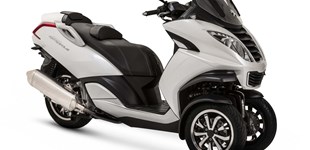 Piaggio MP3 LT 250 2009 vs Peugeot Metropolis 400 2018