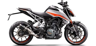 KTM 390 Duke 2022 vs Triumph Tiger Sport 660 2024 KTM 390 Duke 2022 vs Triumph Tiger Sport 660 2024