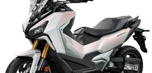 Sym ADX 400 TG 2026 vs Sym MaxSym 400i 2021