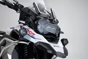 Scheinwerferschutz. Halterung mit Blende. R1200GS (12-),R1250GS (18-)