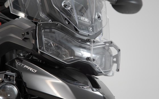 Scheinwerferschutz. Halterung mit Blende. Tiger 900/ GT/ Rally/ Pro. - Bild 1