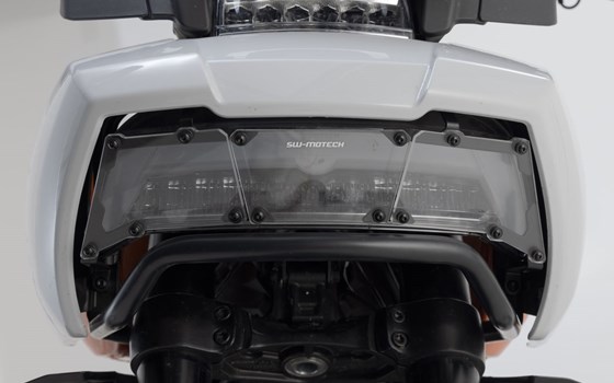 Scheinwerferschutz. Halterung mit Blende. Harley-D Pan America (21-). - Bild 2