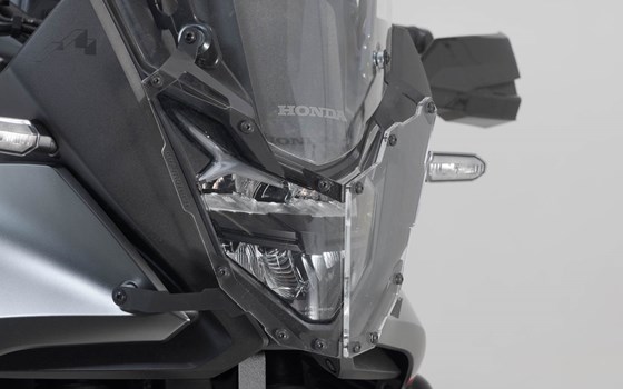 Scheinwerferschutz. Halterung mit Blende. Honda XL750 Transalp. - Bild 1