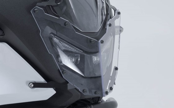 Scheinwerferschutz. Halterung mit Blende. Honda XL750 Transalp (24-). - Bild 1