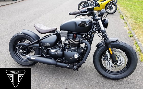 Umgebautes Motorrad Triumph Bonneville Bobber Black von Motorradhaus Löhmer GmbH - Bild 1 Umgebautes Motorrad Triumph Bonneville Bobber Black von Motorradhaus Löhmer GmbH - Bild 1